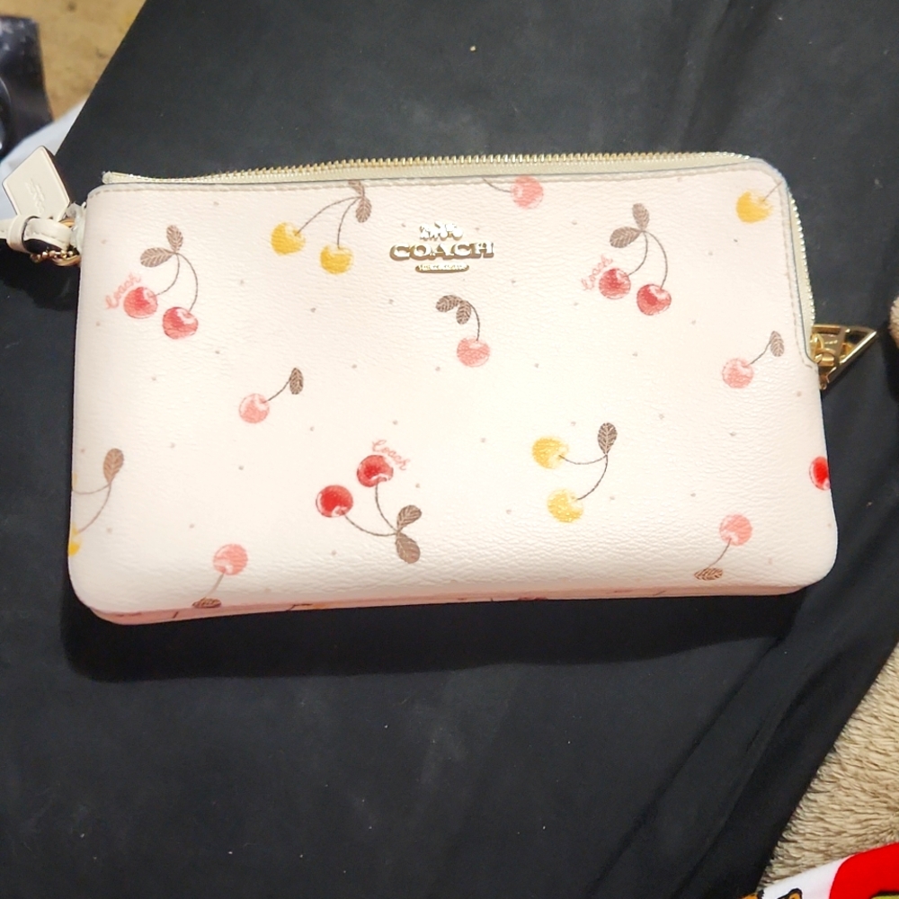 COACH white background, yellow & red cherries. Large wallet.
